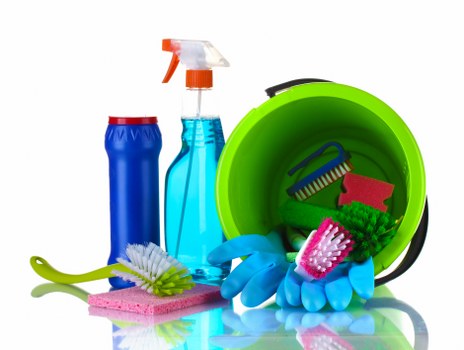 Carpet cleaning professional working in a Tooting home interior