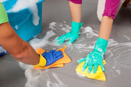 Carpet cleaning team preparing safely in a Tooting property