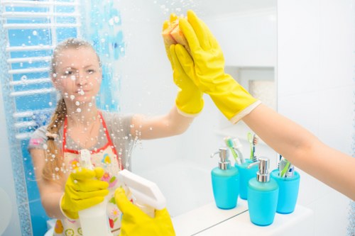 Technician handling carpet cleaning equipment with care